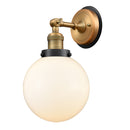 Beacon Sconce shown in the Brushed Brass finish with a Matte White shade