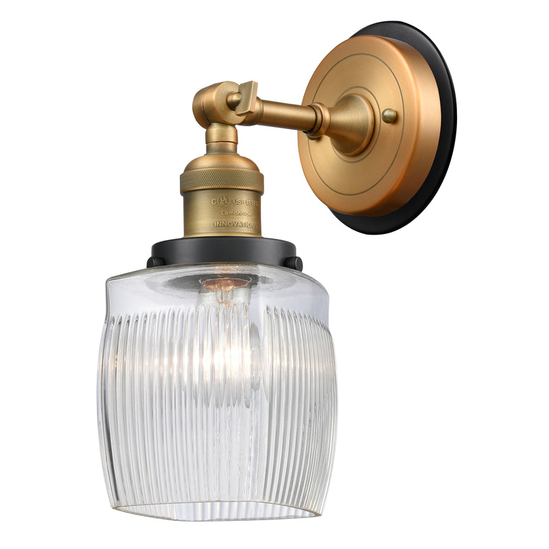 Colton Sconce shown in the Brushed Brass finish with a Clear Halophane shade