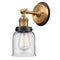 Bell Sconce shown in the Brushed Brass finish with a Clear shade