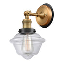 Oxford Sconce shown in the Brushed Brass finish with a Clear shade