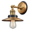 Railroad Sconce shown in the Brushed Brass finish with a Antique Copper shade