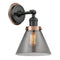 Cone Sconce shown in the Matte Black finish with a Plated Smoke shade