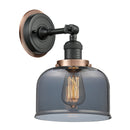 Bell Sconce shown in the Matte Black finish with a Plated Smoke shade