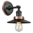 Railroad Sconce shown in the Matte Black finish with a Antique Copper shade