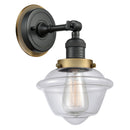 Oxford Sconce shown in the Matte Black finish with a Clear shade