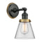 Cone Sconce shown in the Matte Black finish with a Clear shade