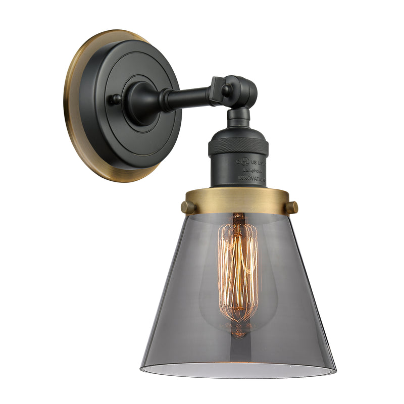 Cone Sconce shown in the Matte Black finish with a Plated Smoke shade