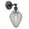 Geneseo Sconce shown in the Matte Black finish with a Clear Crackled shade