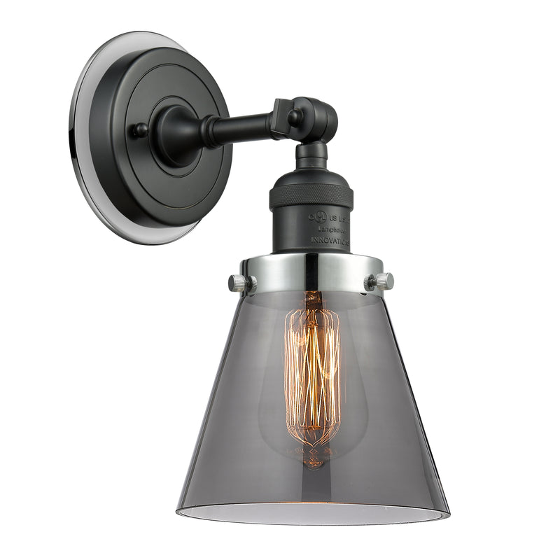 Cone Sconce shown in the Matte Black finish with a Plated Smoke shade