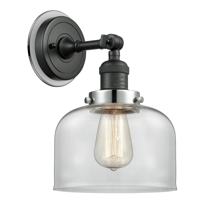 Bell Sconce shown in the Matte Black finish with a Clear shade