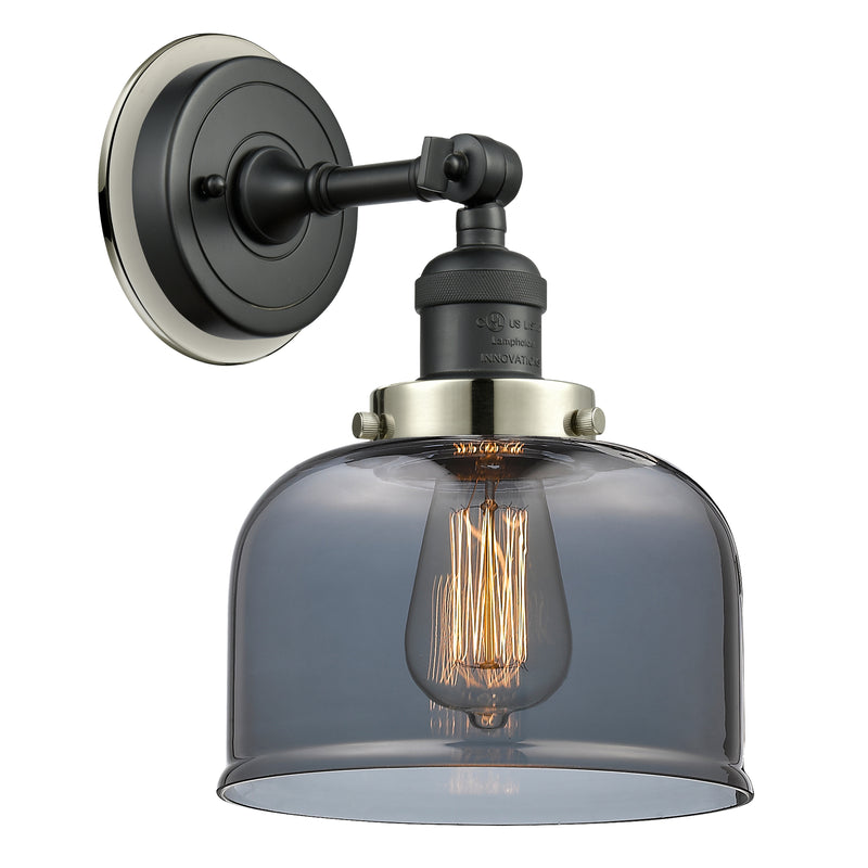 Bell Sconce shown in the Matte Black finish with a Plated Smoke shade