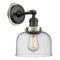 Bell Sconce shown in the Matte Black finish with a Seedy shade