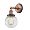 Beacon Sconce shown in the Antique Copper finish with a Clear shade