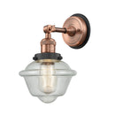 Oxford Sconce shown in the Antique Copper finish with a Seedy shade