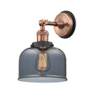 Bell Sconce shown in the Antique Copper finish with a Plated Smoke shade