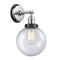 Beacon Sconce shown in the Polished Chrome finish with a Seedy shade