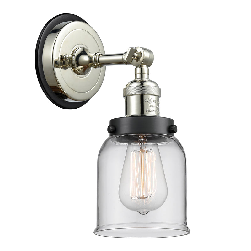 Bell Sconce shown in the Polished Nickel finish with a Clear shade