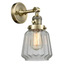 Chatham Sconce shown in the Antique Brass finish with a Clear shade