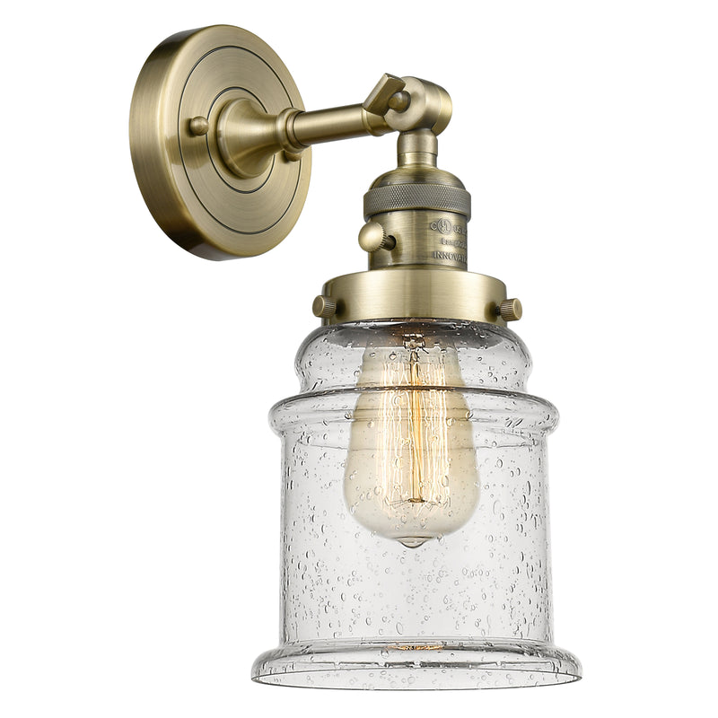 Canton Sconce shown in the Antique Brass finish with a Seedy shade