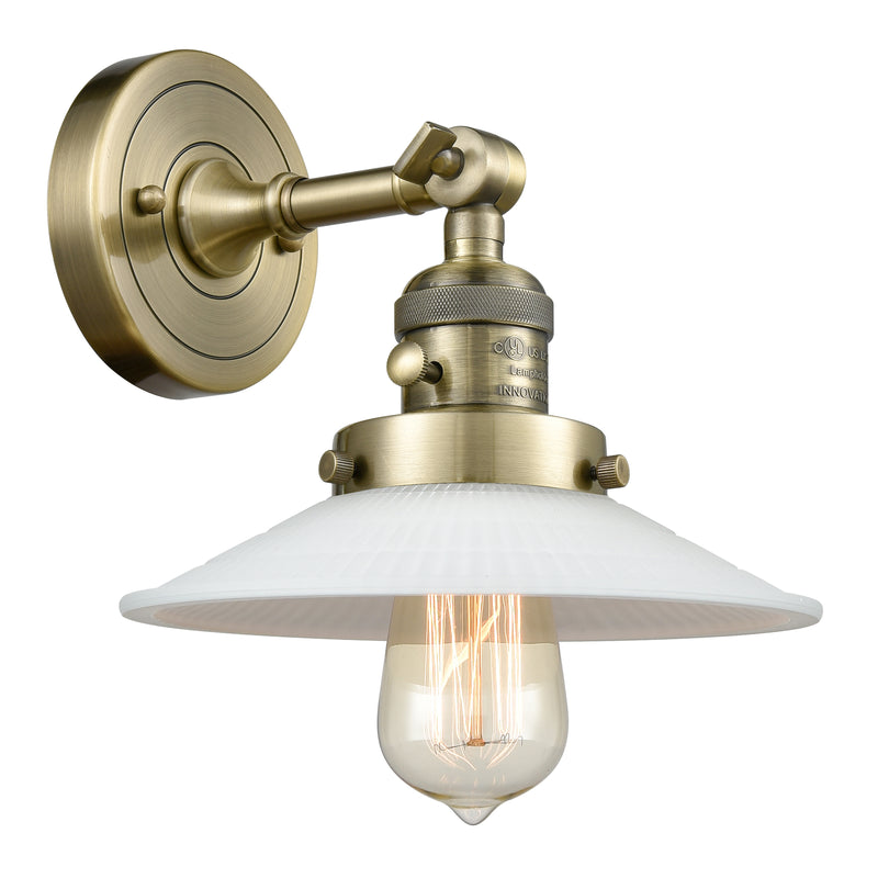 Halophane Sconce shown in the Antique Brass finish with a Matte White Halophane shade