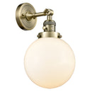 Beacon Sconce shown in the Antique Brass finish with a Matte White shade