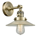 Halophane Sconce shown in the Antique Brass finish with a Clear Halophane shade