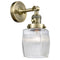 Colton Sconce shown in the Antique Brass finish with a Clear Halophane shade