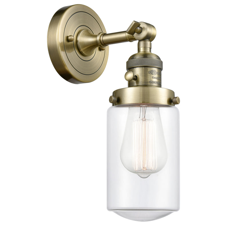 Dover Sconce shown in the Antique Brass finish with a Clear shade