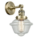 Oxford Sconce shown in the Antique Brass finish with a Seedy shade