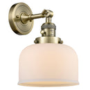 Bell Sconce shown in the Antique Brass finish with a Matte White shade