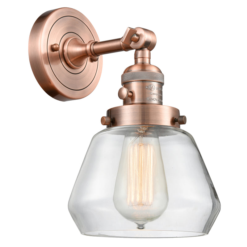 Fulton Sconce shown in the Antique Copper finish with a Clear shade