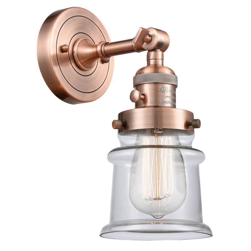 Canton Sconce shown in the Antique Copper finish with a Clear shade