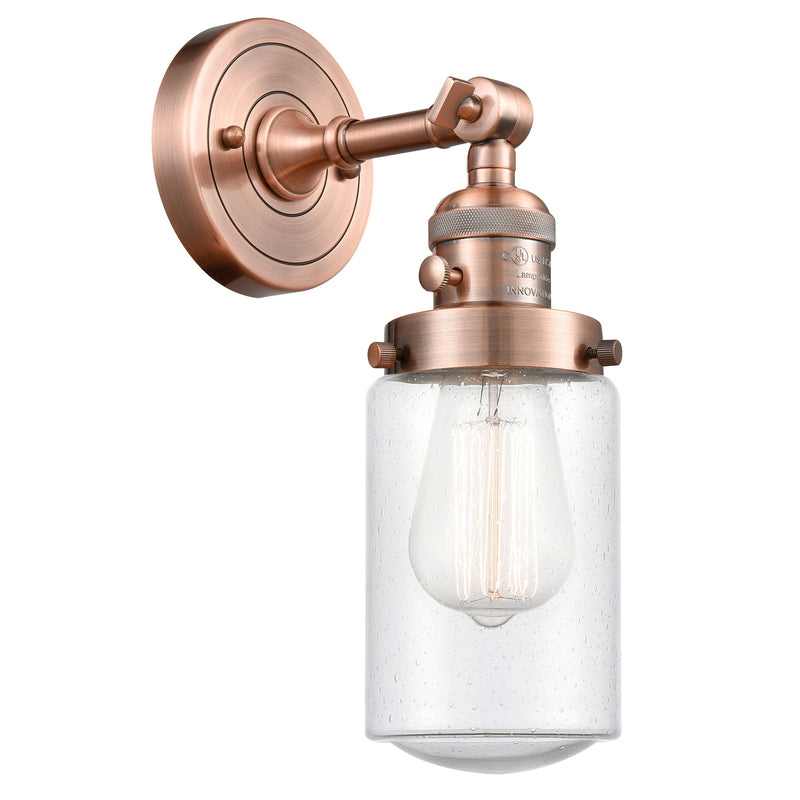 Dover Sconce shown in the Antique Copper finish with a Seedy shade