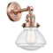 Olean Sconce shown in the Antique Copper finish with a Seedy shade