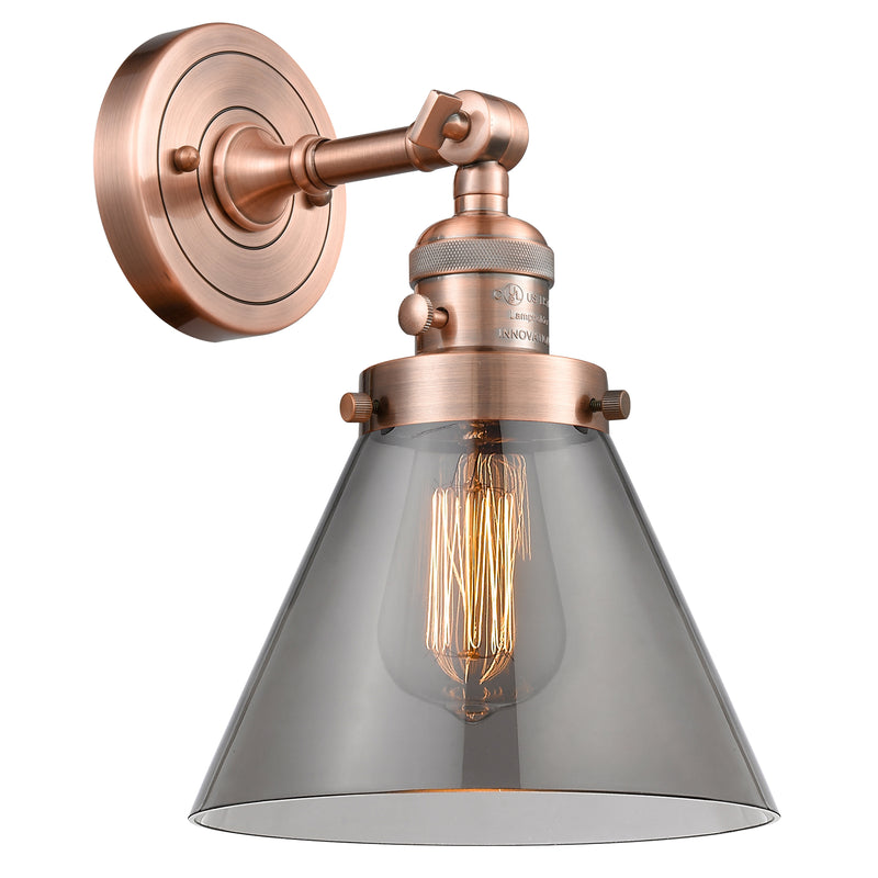 Cone Sconce shown in the Antique Copper finish with a Plated Smoke shade