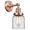 Bell Sconce shown in the Antique Copper finish with a Clear shade