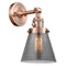 Cone Sconce shown in the Antique Copper finish with a Plated Smoke shade