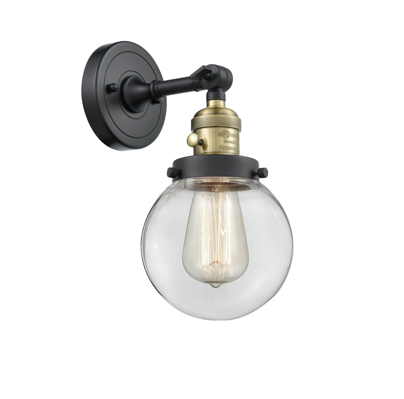 Innovations Lighting Beacon 1-100 watt 6 inch Black Antique Brass Sconce with Clear glass and Solid Brass 180 Degree Adjustable Swivel With Engraved Cast Cup Includes a "High-Low-Off" Switch. 203SWBABG2026