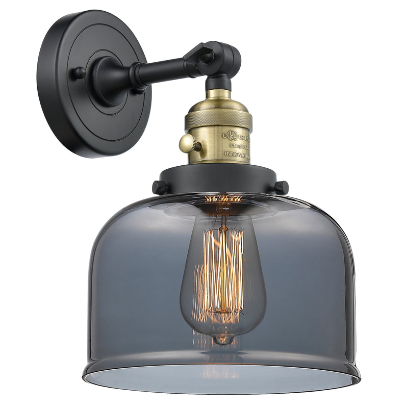 Bell Sconce shown in the Black Antique Brass finish with a Plated Smoke shade