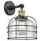 Bell Cage Sconce shown in the Black Antique Brass finish with a Seedy shade