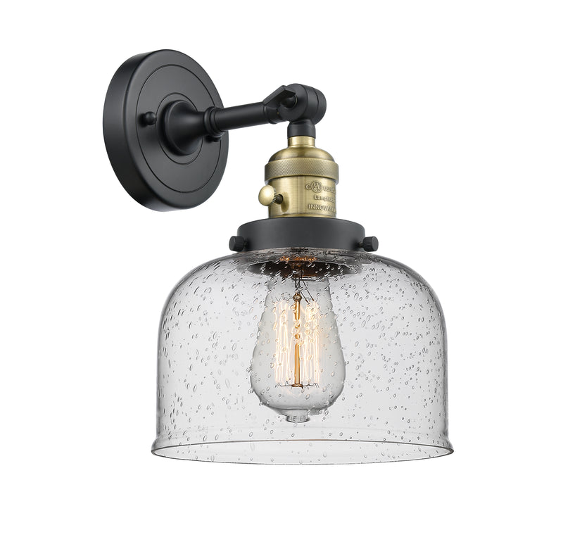 Innovations Lighting Large Bell 1-100 watt 8 inch Black Antique Brass Sconce with Seedy glass and Solid Brass 180 Degree Adjustable Swivel With Engraved Cast Cup Includes a "High-Low-Off" Switch. 203SWBABG74