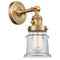 Canton Sconce shown in the Brushed Brass finish with a Clear shade