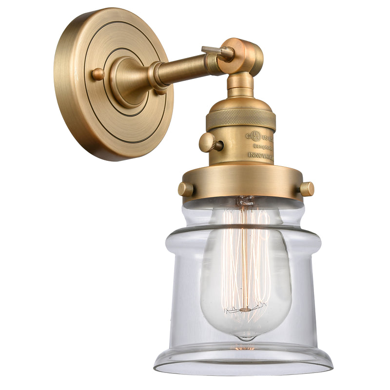 Canton Sconce shown in the Brushed Brass finish with a Clear shade