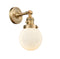 Innovations Lighting Beacon 1-100 watt 6 inch Brushed Brass Sconce with Matte White Cased glass and Solid Brass 180 Degree Adjustable Swivel With Engraved Cast Cup Includes a "High-Low-Off" Switch. 203SWBBG2016