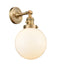 Innovations Lighting Beacon 1-100 watt 8 inch Brushed Brass Sconce with Matte White Cased glass and Solid Brass 180 Degree Adjustable Swivel With Engraved Cast Cup Includes a "High-Low-Off" Switch. 203SWBBG2018