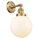 Beacon Sconce shown in the Brushed Brass finish with a Matte White shade