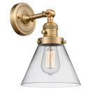 Cone Sconce shown in the Brushed Brass finish with a Clear shade