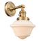 Oxford Sconce shown in the Brushed Brass finish with a Matte White shade