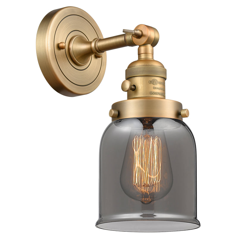 Bell Sconce shown in the Brushed Brass finish with a Plated Smoke shade