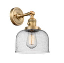 Innovations Lighting Large Bell 1-100 watt 8 inch Brushed Brass Sconce with Seedy glass and Solid Brass 180 Degree Adjustable Swivel With Engraved Cast Cup Includes a "High-Low-Off" Switch. 203SWBBG74